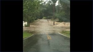 Officials in Harford County searching for three persons swept away by flash flood waters