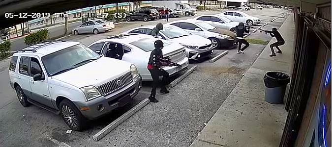 Chaotic and potentially deadly broad daylight armed robbery caught on video