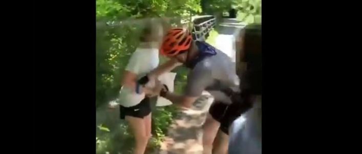 Cops want to I.D. white cyclist who attacked white children posting Black Lives Matter flyers (Video)
