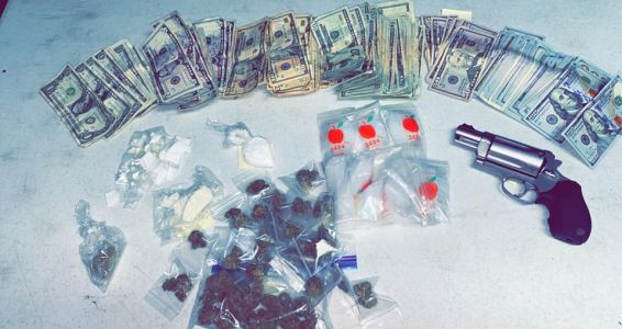 Ace News Today - Drugs, gun, money:  SWAT takes down drug house in Vero Beach