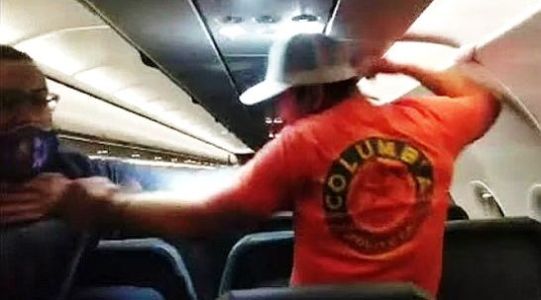 Ace News Today - Drunken, violent passenger duct taped to his seat after groping and assaulting flight attendants