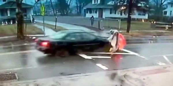Hero cop saves child from vehicle speeding through school crossing (Video)