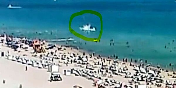 Miami Beach: Helicopter crashes into the ocean during crowded holiday weekend (Video)