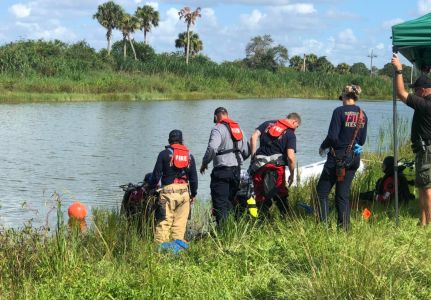 Ace News Today - Submerged car and two bodies recovered from Indiantown pond