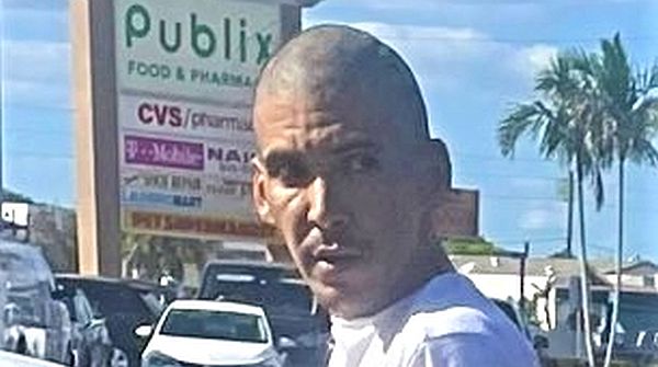 Suspect sought after stabbing man outside Publix, attacking him with a baseball bat and machete