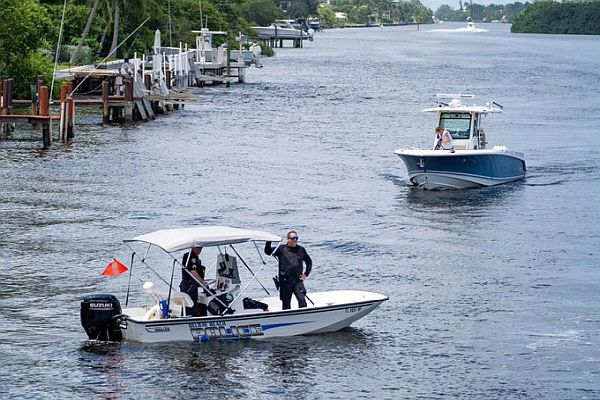 Police investigating three suitcases filled with human remains found along Intercoastal Waterway in Delray Beach