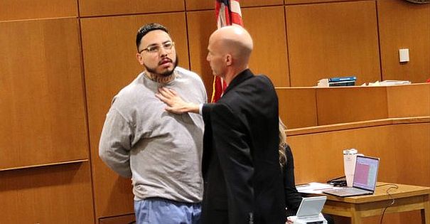 At his sentencing hearing, a convicted killer was attacked in court by his female victim’s stepdad