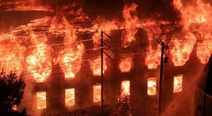 Massive six-alarm fire tears through Allentown industrial building, damaging homes, forcing evacuations