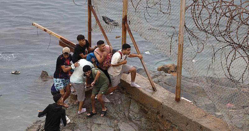 Ace News Today: Death toll climbs after massive migrant surge overwhelms Spain's Ceuta border. Image credit: X