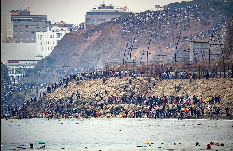Ace News Today: Death toll climbs after massive migrant surge overwhelms Spain's Ceuta border. Image credit: X